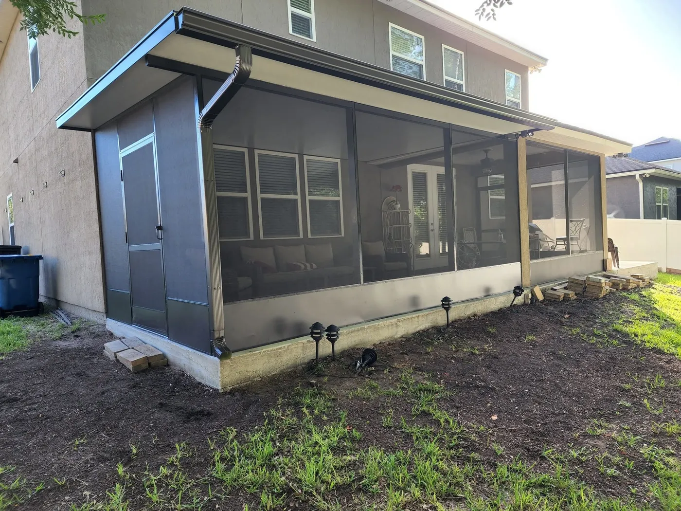 Newly built screen enclosure on a Greater Jacksonville, FL home, built from the footing up